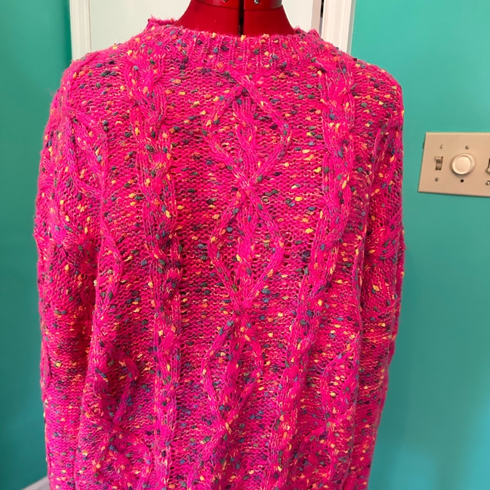 Hot pink sweater with specks for color